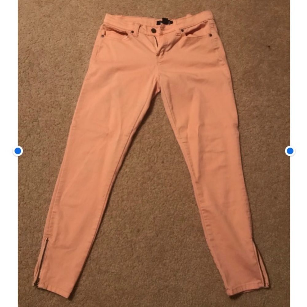 Peach denim pants.